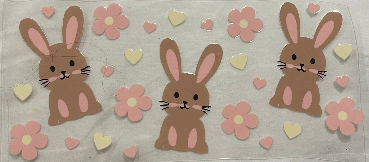 Brown bunny pink flowers